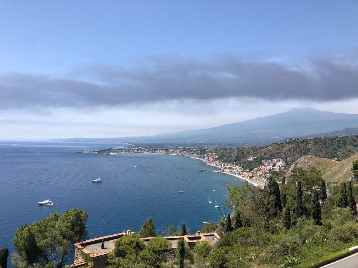 The bay seen from Taormina, with Etna behind